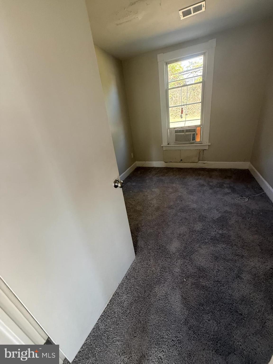 208 68th Place Capitol Heights, MD 20743 - Photo 9 of 15 an empty room with a windows