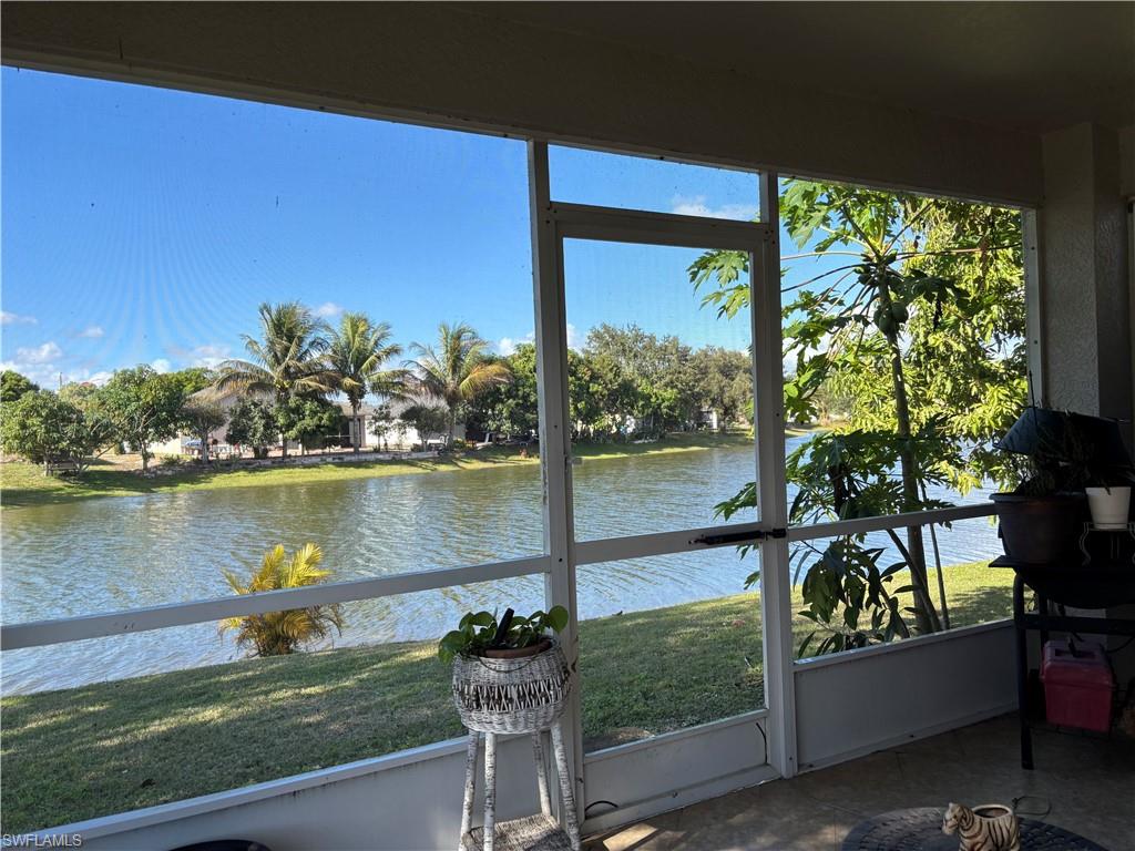 1243 Madison Court Immokalee, FL 34142 - Photo 23 of 32 a view of a garden from a lake