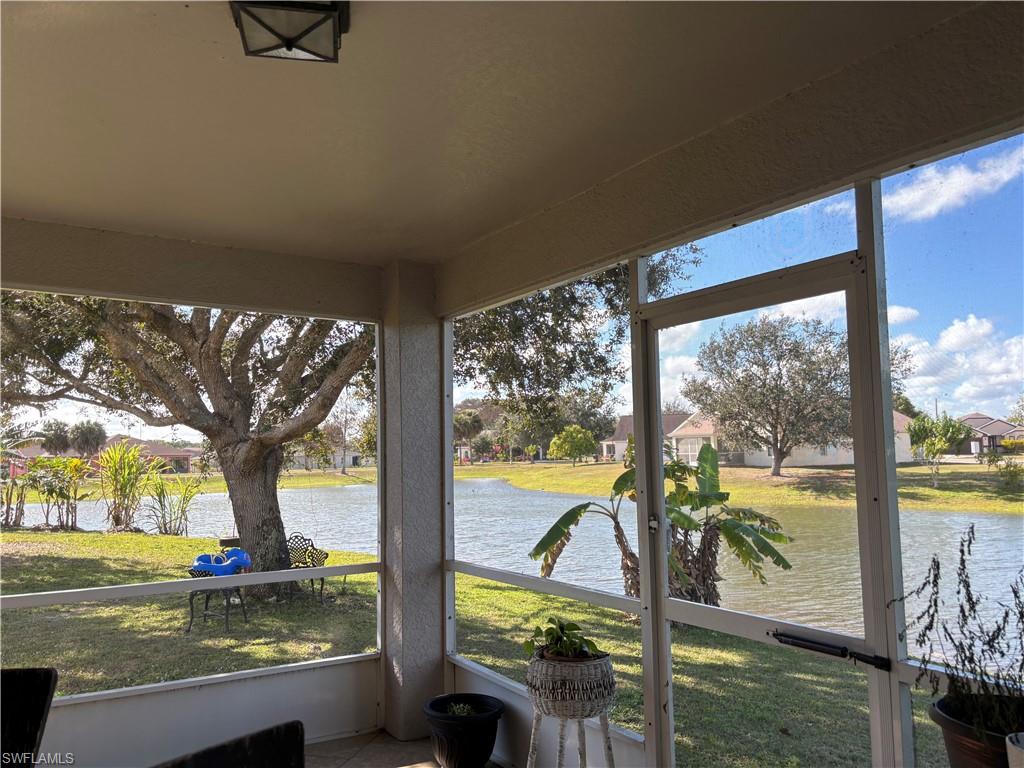 1243 Madison Court Immokalee, FL 34142 - Photo 24 of 32 a view of swimming pool from a balcony