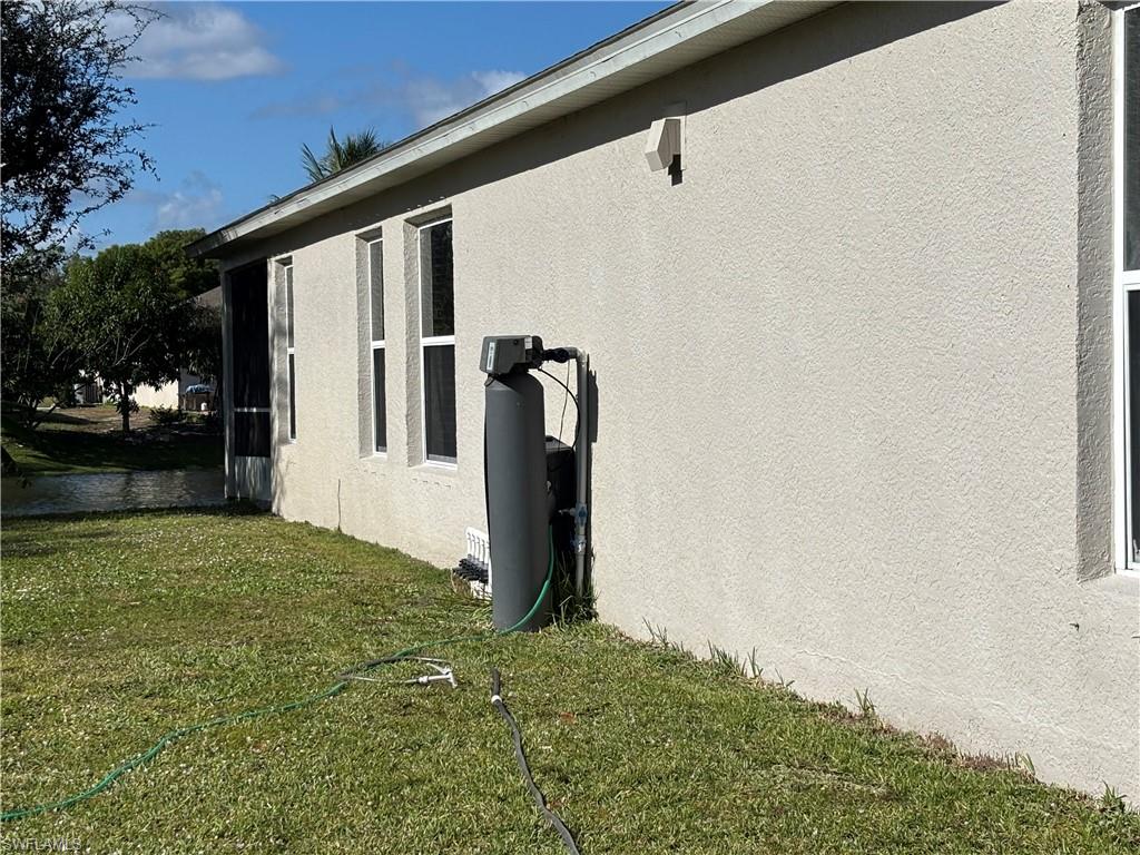 1243 Madison Court Immokalee, FL 34142 - Photo 6 of 32 a view of a back yard