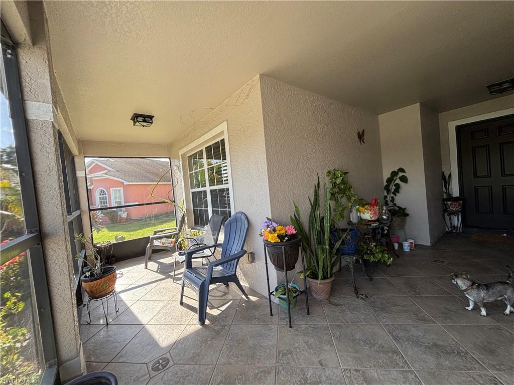 1243 Madison Court Immokalee, FL 34142 - Photo 7 of 32 a living room filled with furniture