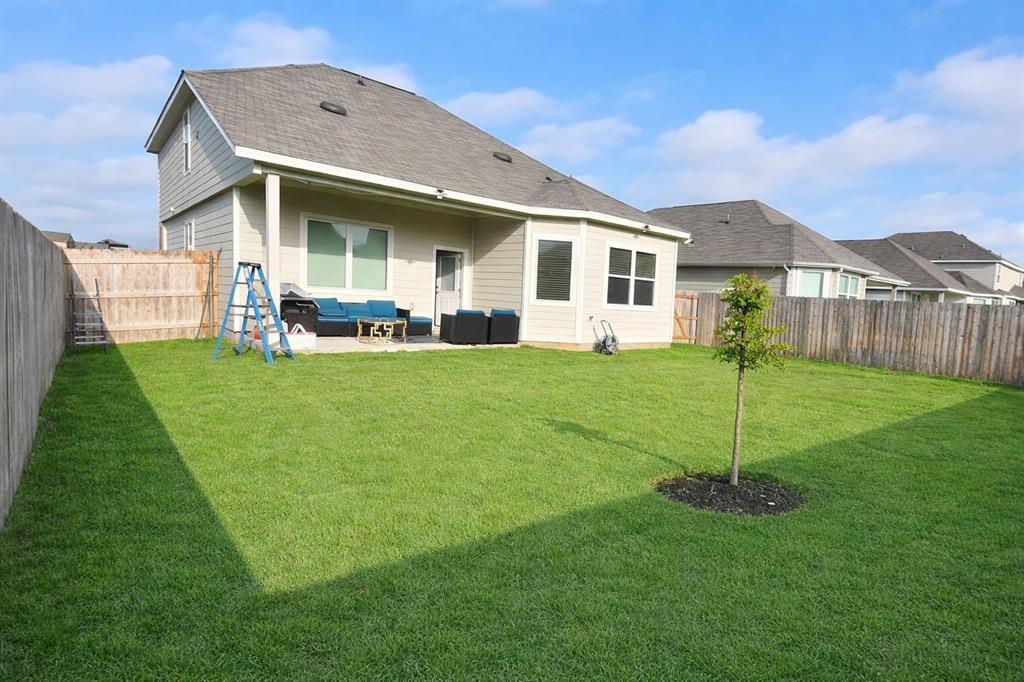 9824 Dynamic Drive Fort Worth, TX 76131 - Photo 17 of 17 a view of a house with a yard and porch