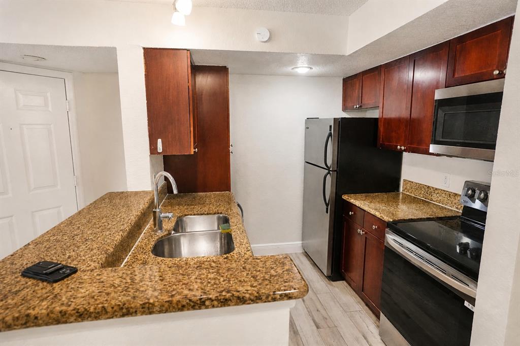 5156 Conroy Road, Unit 16 Orlando, FL 32811 - Photo 2 of 21 Gallery Image 2