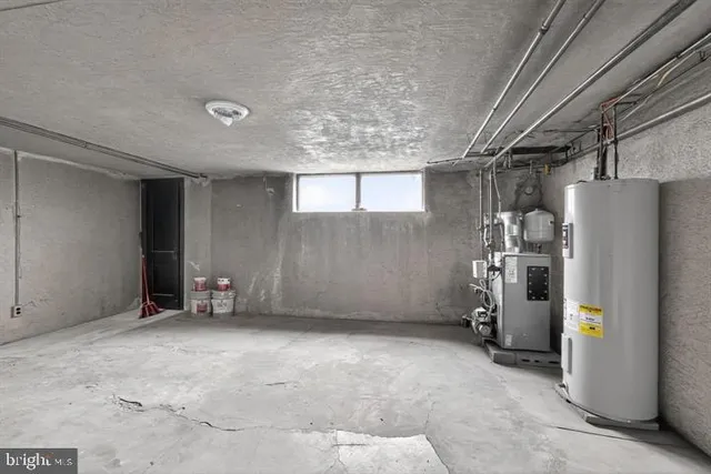 a view of a hallway with seating area