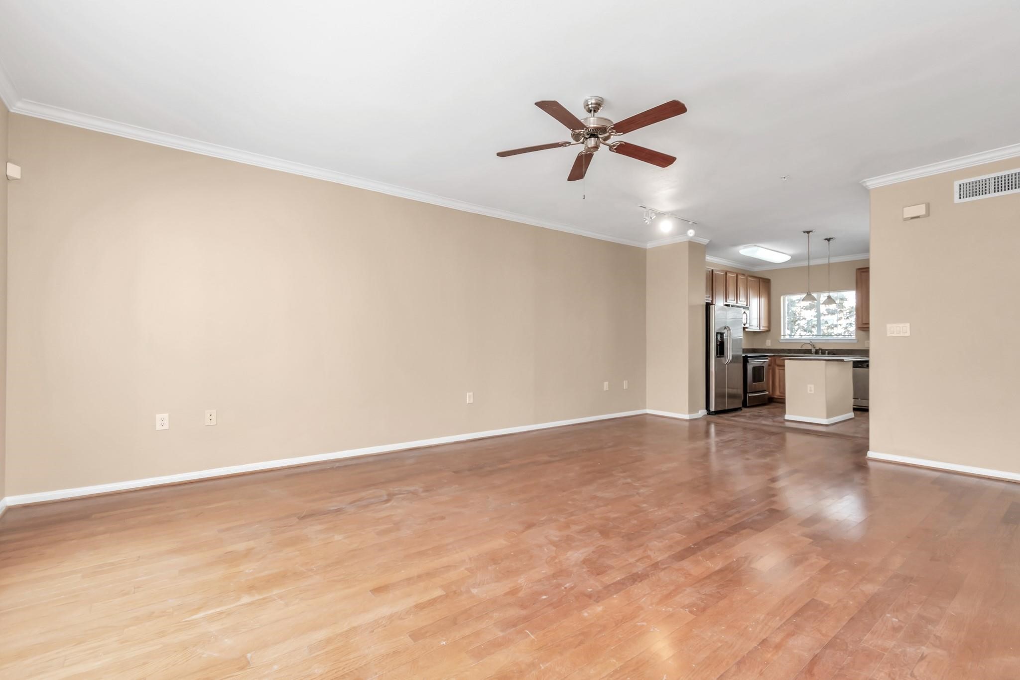 9200 Westheimer Road, Unit 1607 Houston, TX 77063 - Photo 14 of 34 a view of an empty room with a window