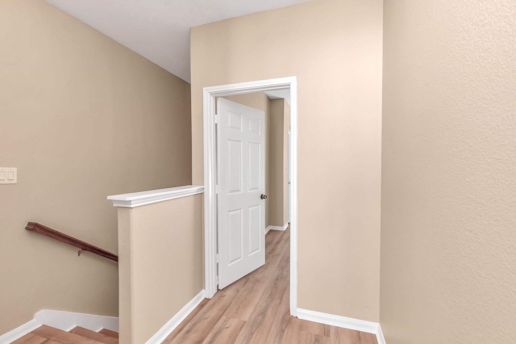 9200 Westheimer Road, Unit 1607 Houston, TX 77063 - Photo 24 of 34 a view of a room with wooden floor
