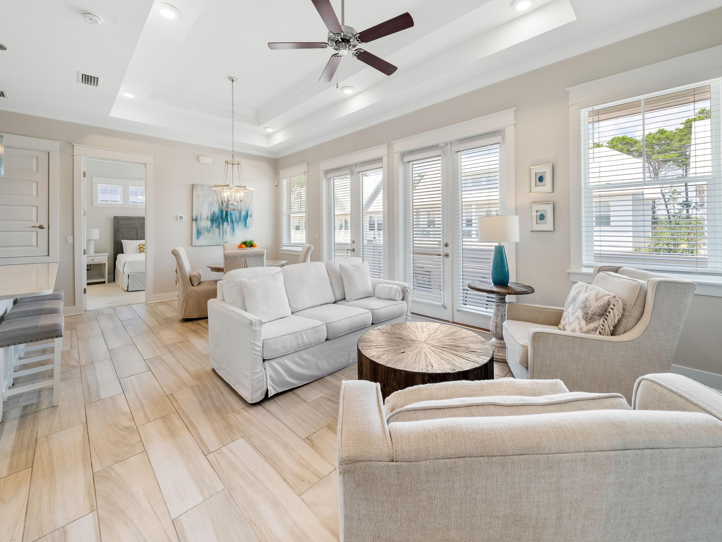 282 Milestone Dr Inlet Beach, Unit C Inlet Beach, FL 32461 - Photo 1 of 50 a living room with furniture and a large window