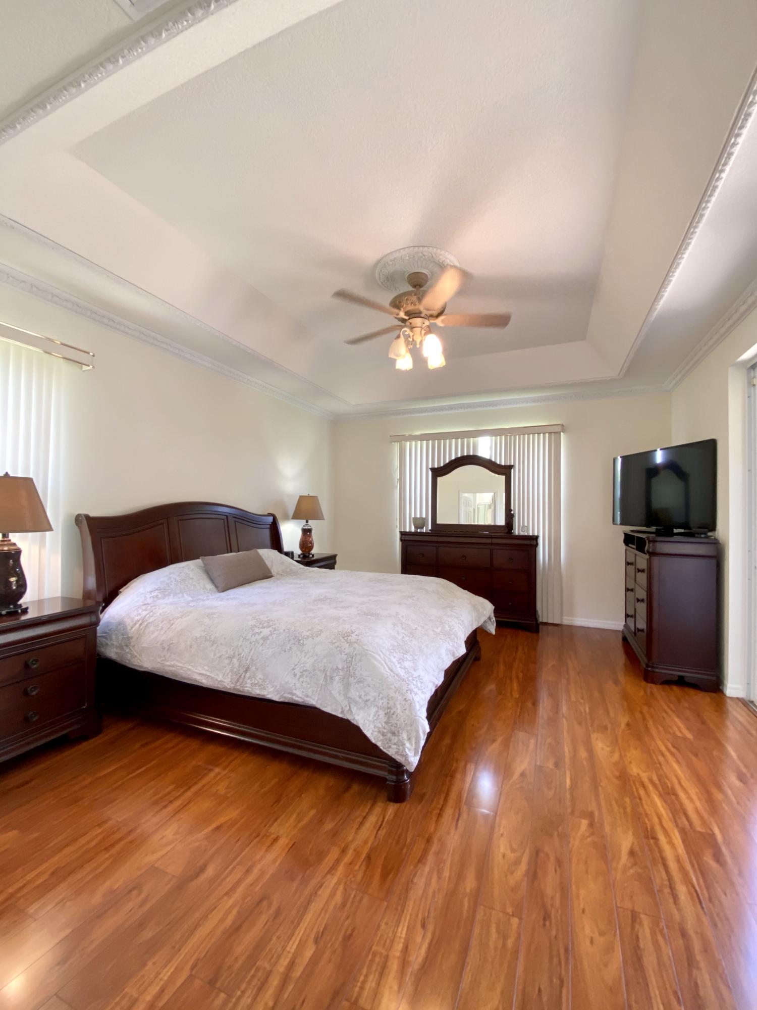 12355 Cascades Pointe Drive Boca Raton, FL 33428 - Photo 18 of 36 Master bedroom