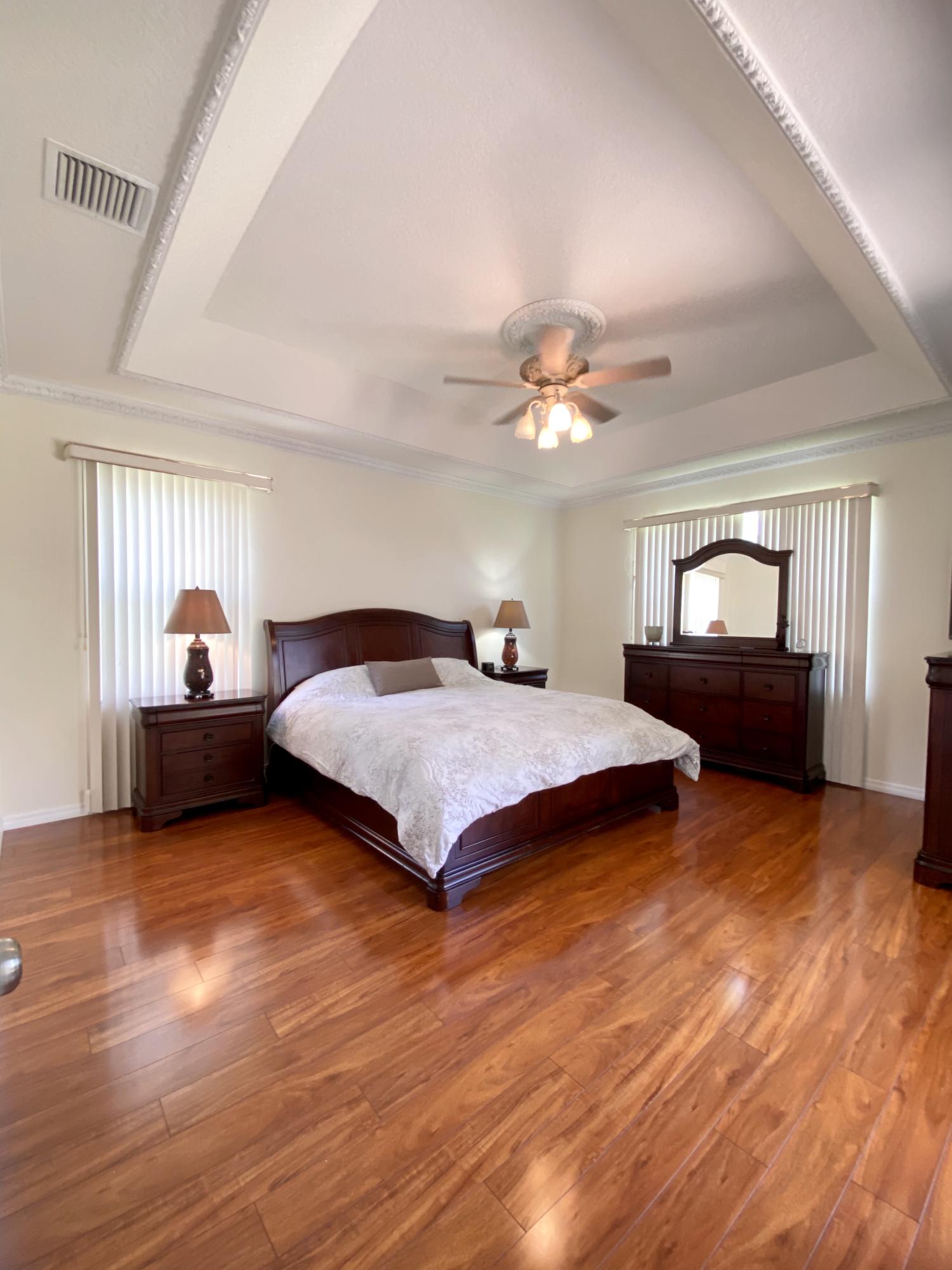 12355 Cascades Pointe Drive Boca Raton, FL 33428 - Photo 19 of 36 Master bedroom