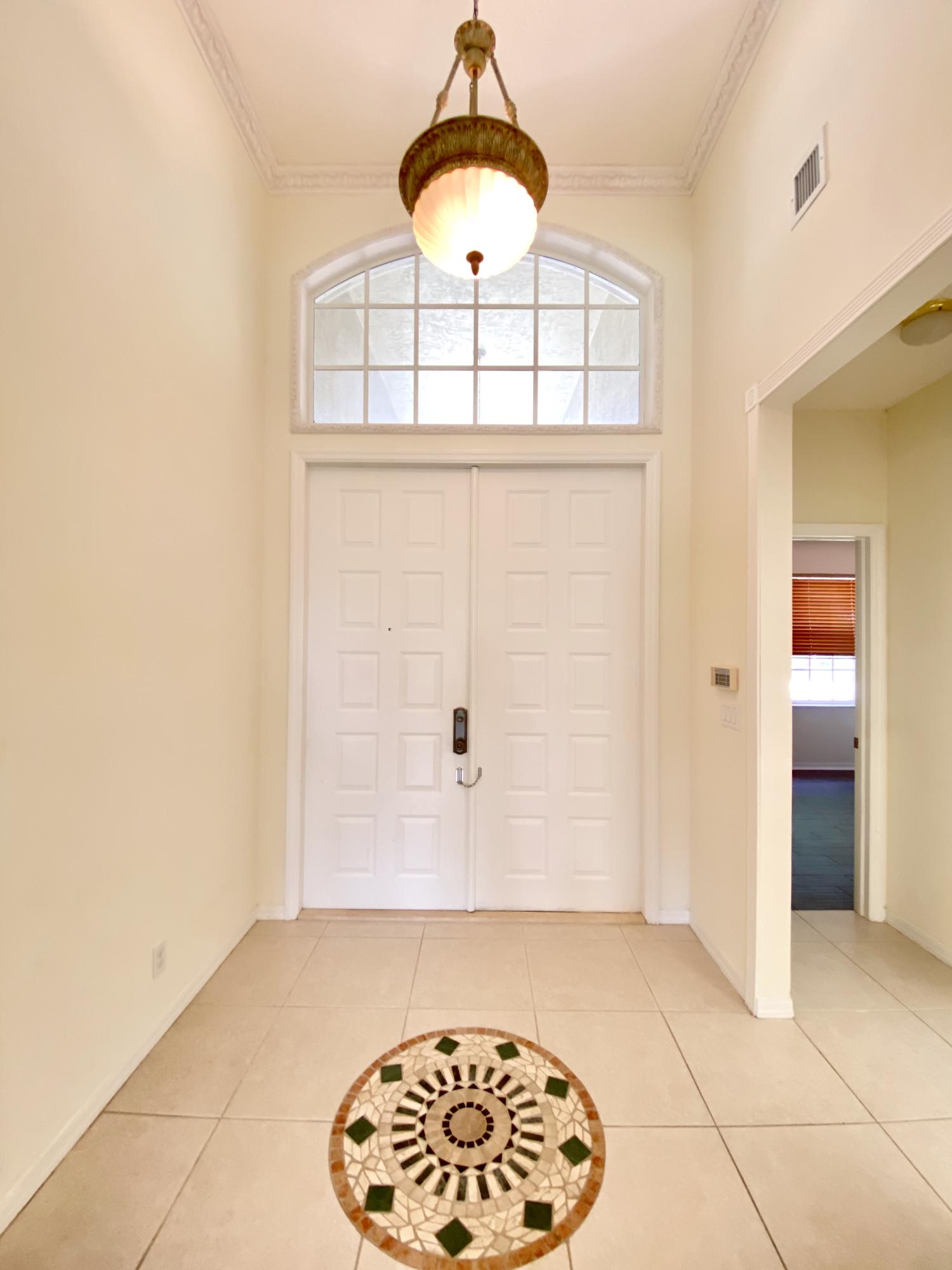 12355 Cascades Pointe Drive Boca Raton, FL 33428 - Photo 5 of 36 Foyer