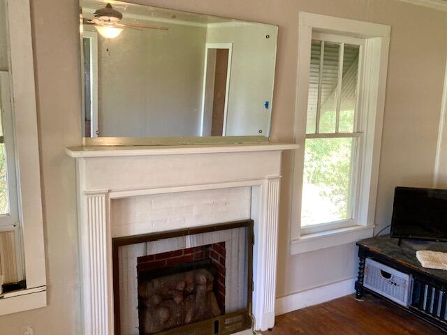 17 Nowling Drive DeFuniak Springs, FL 32433 - Photo 14 of 52 a living room with a fireplace and a window
