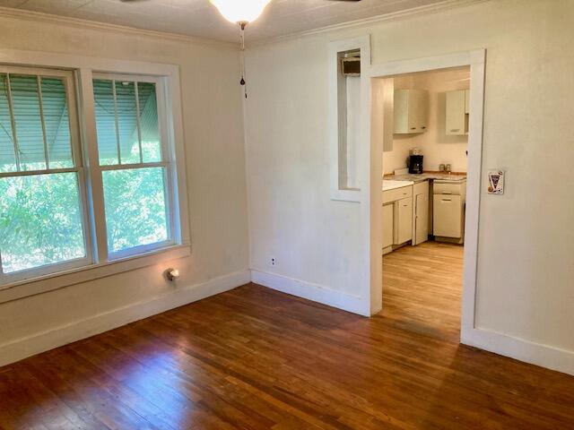 17 Nowling Drive DeFuniak Springs, FL 32433 - Photo 17 of 52 a view of a room with wooden floor and a window