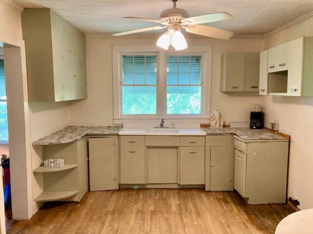 17 Nowling Drive DeFuniak Springs, FL 32433 - Photo 19 of 52 a kitchen with a stove a sink and a window