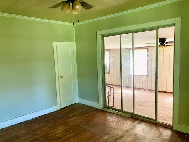 17 Nowling Drive DeFuniak Springs, FL 32433 - Photo 28 of 52 a view of empty room with wooden floor and fan