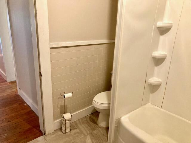 17 Nowling Drive DeFuniak Springs, FL 32433 - Photo 32 of 52 a white toilet sitting next to a bathroom sink