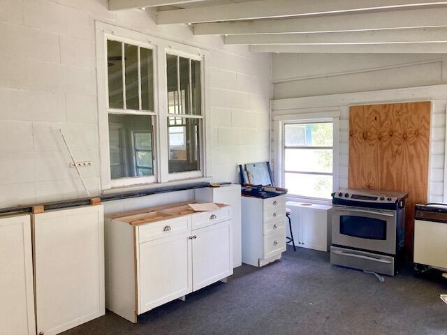 17 Nowling Drive DeFuniak Springs, FL 32433 - Photo 10 of 52 a kitchen with white cabinets and sink