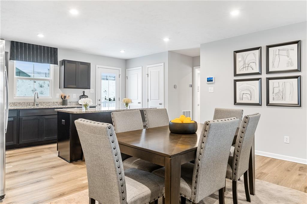 101 Jerome Drive Butler, PA 16001 - Photo 14 of 34 a view of a dining room with furniture and window