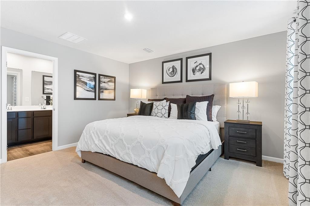 101 Jerome Drive Butler, PA 16001 - Photo 17 of 34 a bedroom with a bed and a chandelier