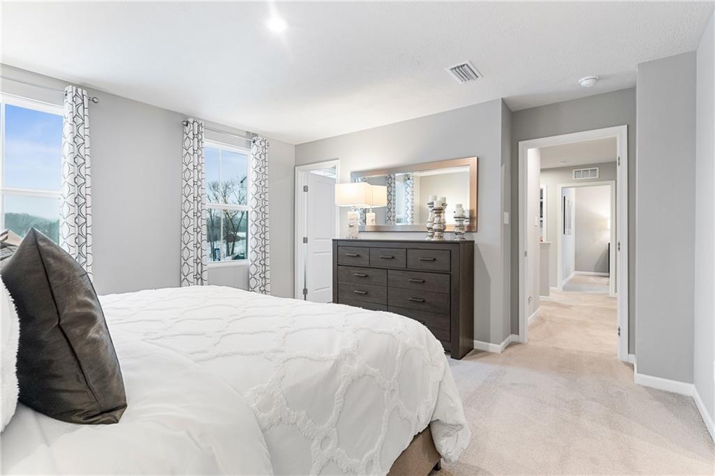 101 Jerome Drive Butler, PA 16001 - Photo 18 of 34 a spacious bedroom with a bed and a dresser