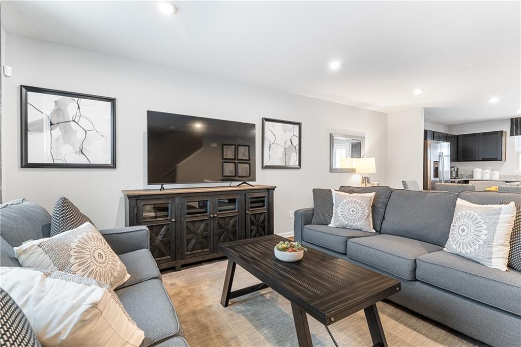 101 Jerome Drive Butler, PA 16001 - Photo 3 of 34 a living room with furniture and a flat screen tv