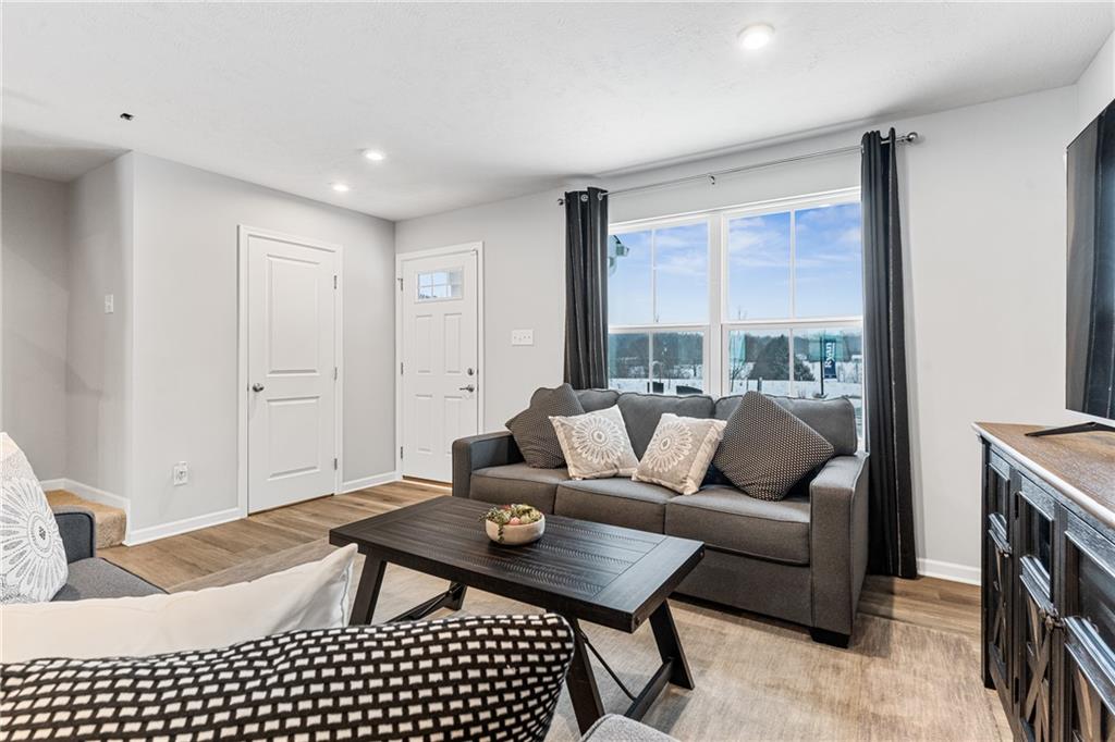 101 Jerome Drive Butler, PA 16001 - Photo 5 of 34 a living room with furniture and a lamp