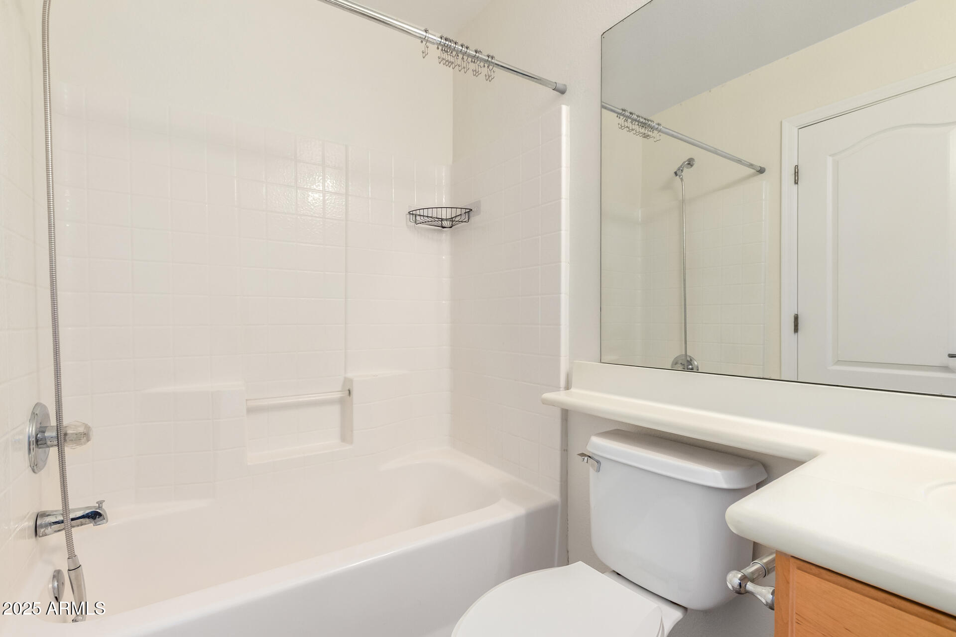 2201 North Comanche Drive, Unit 1104 Chandler, AZ 85224 - Photo 18 of 25 a bathroom with a toilet and a bathtub