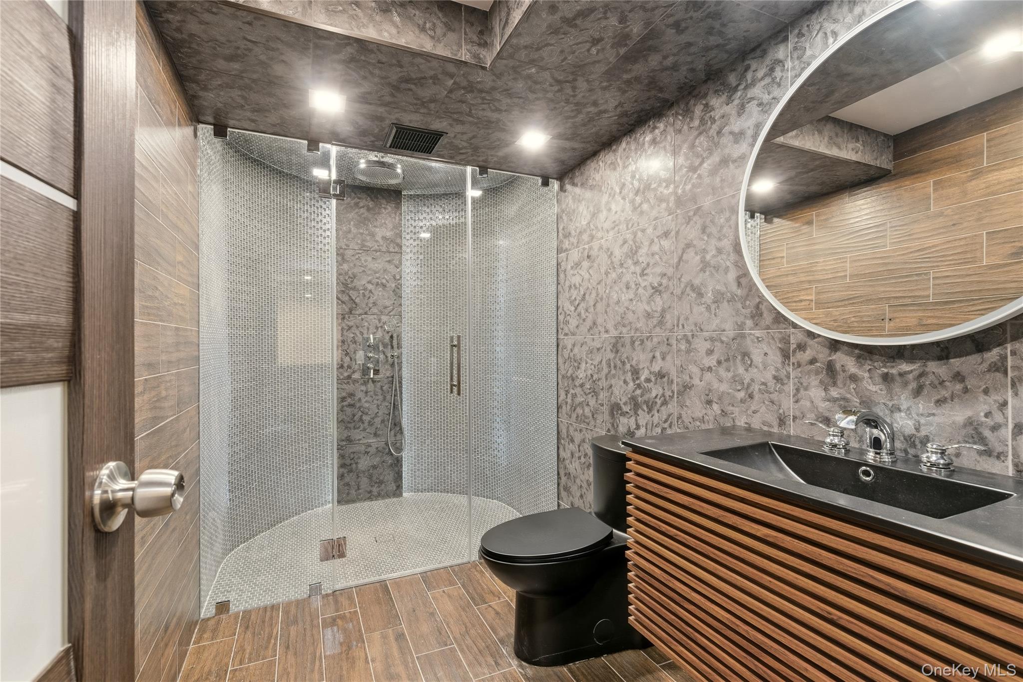 55 Coves Run Syosset, NY 11791 - Photo 50 of 50 a bathroom with a sink toilet and shower