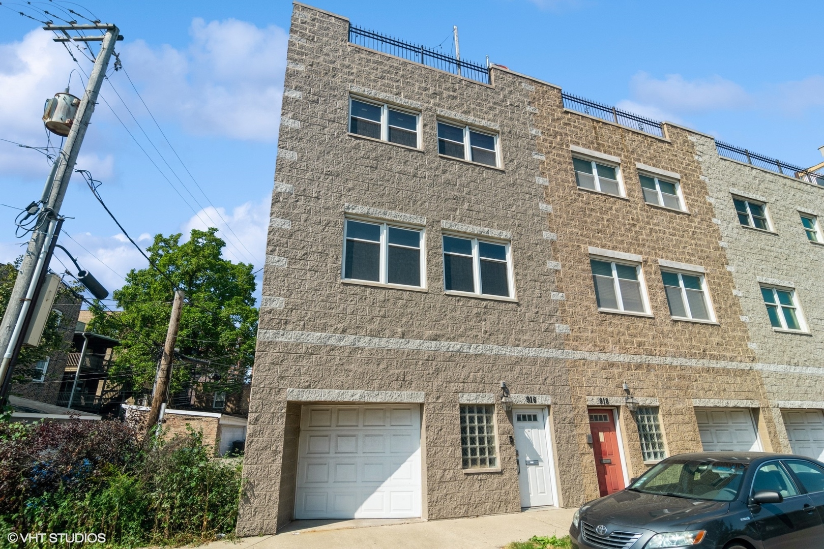 Undisclosed Address Chicago, IL 60642 - Photo 1 of 17 a front view of a building with parking space