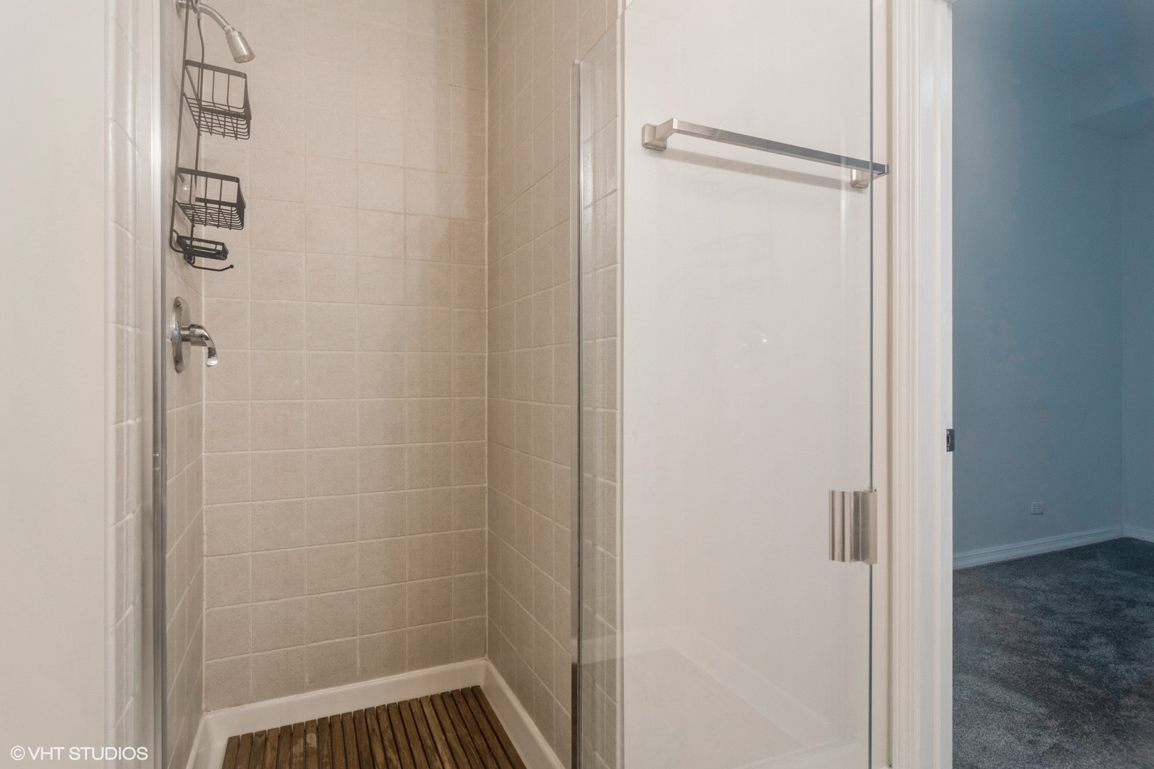 Undisclosed Address Chicago, IL 60642 - Photo 14 of 17 a bathroom with a glass shower door