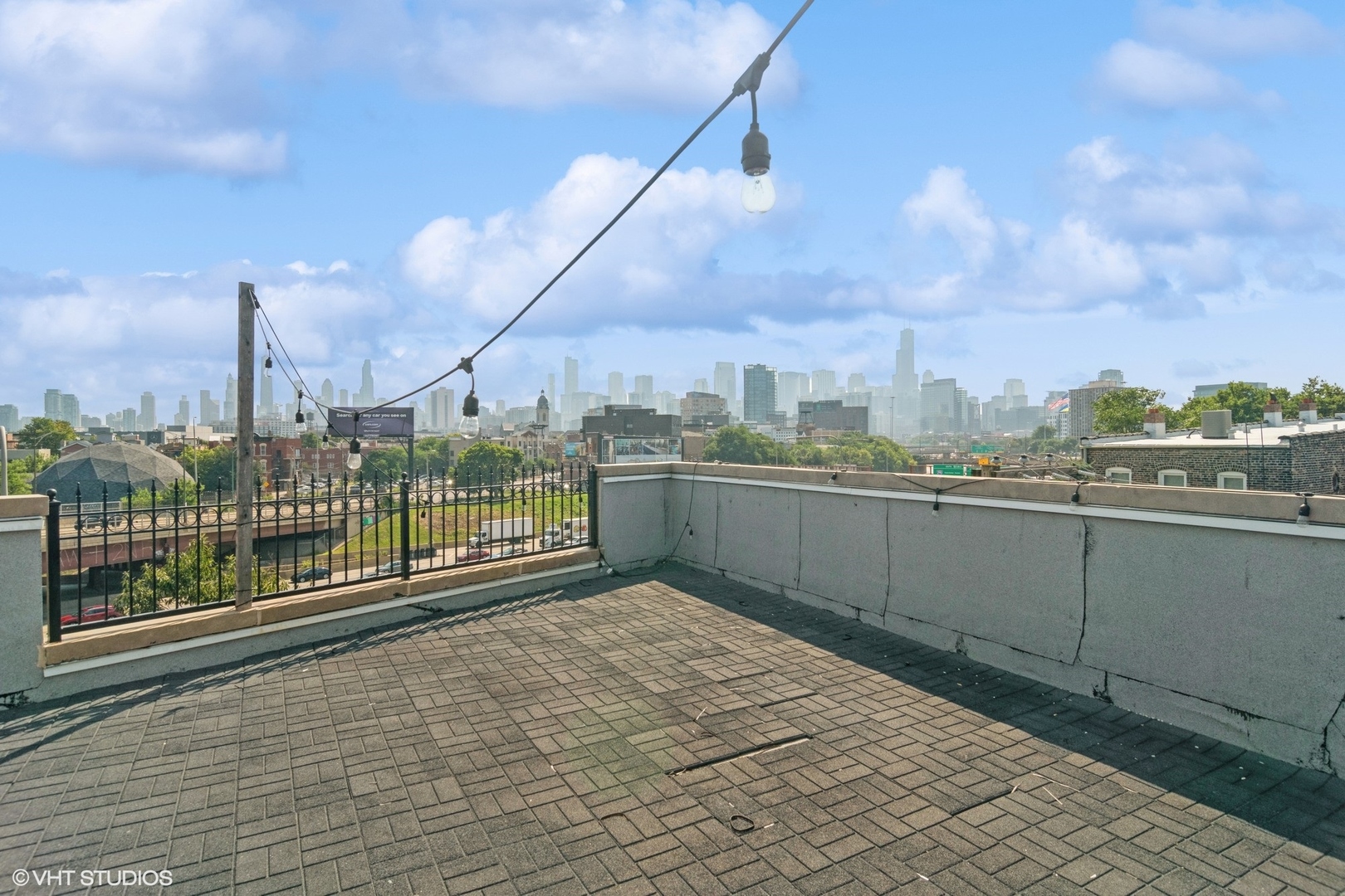 Undisclosed Address Chicago, IL 60642 - Photo 16 of 17 a view of a balcony with city view