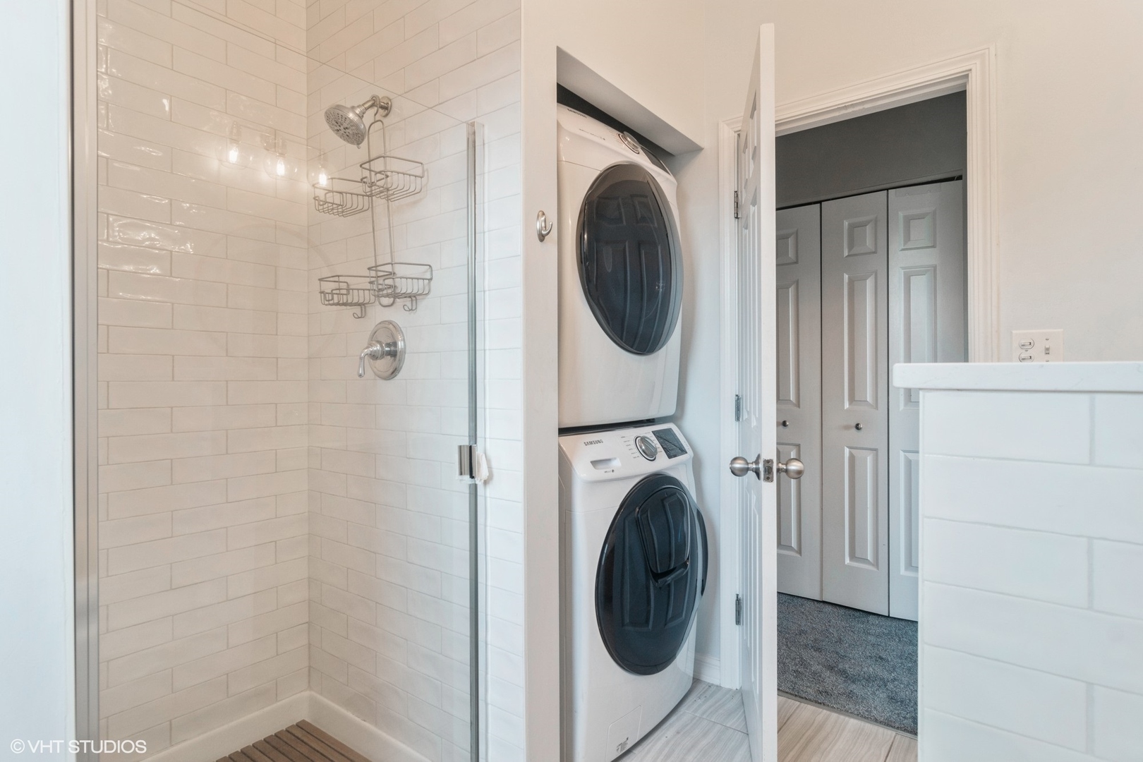 Undisclosed Address Chicago, IL 60642 - Photo 9 of 17 a view of a hallway with washer and dryer