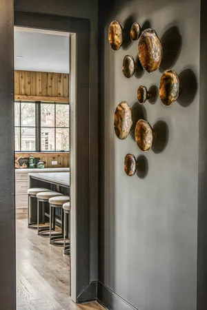 a stove top oven sitting inside of a kitchen