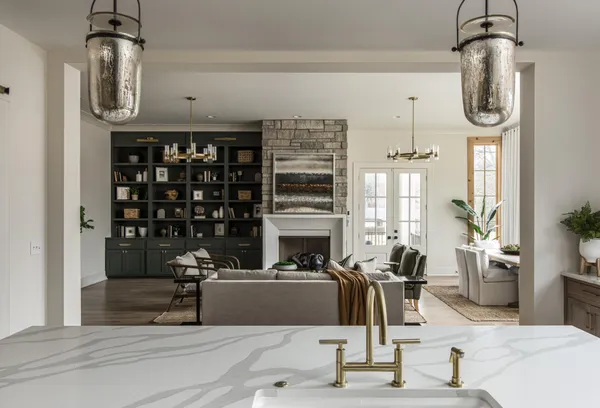 a spacious bathroom with a granite countertop sink mirror and double