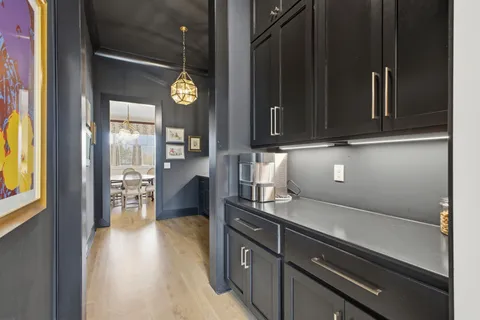 a bathroom with a granite countertop sink a mirror and a