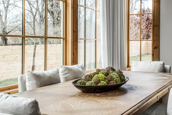 a bedroom with a bed and a night stand