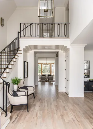 a view of a living room and floor to ceiling window