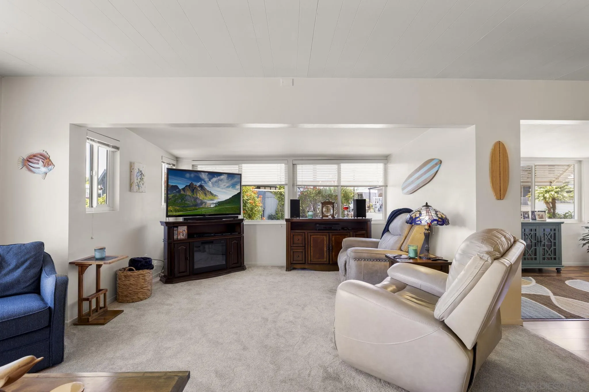 116 Havenview Lane Oceanside, CA 92056 - Photo 11 of 47 a living room with furniture and a flat screen tv