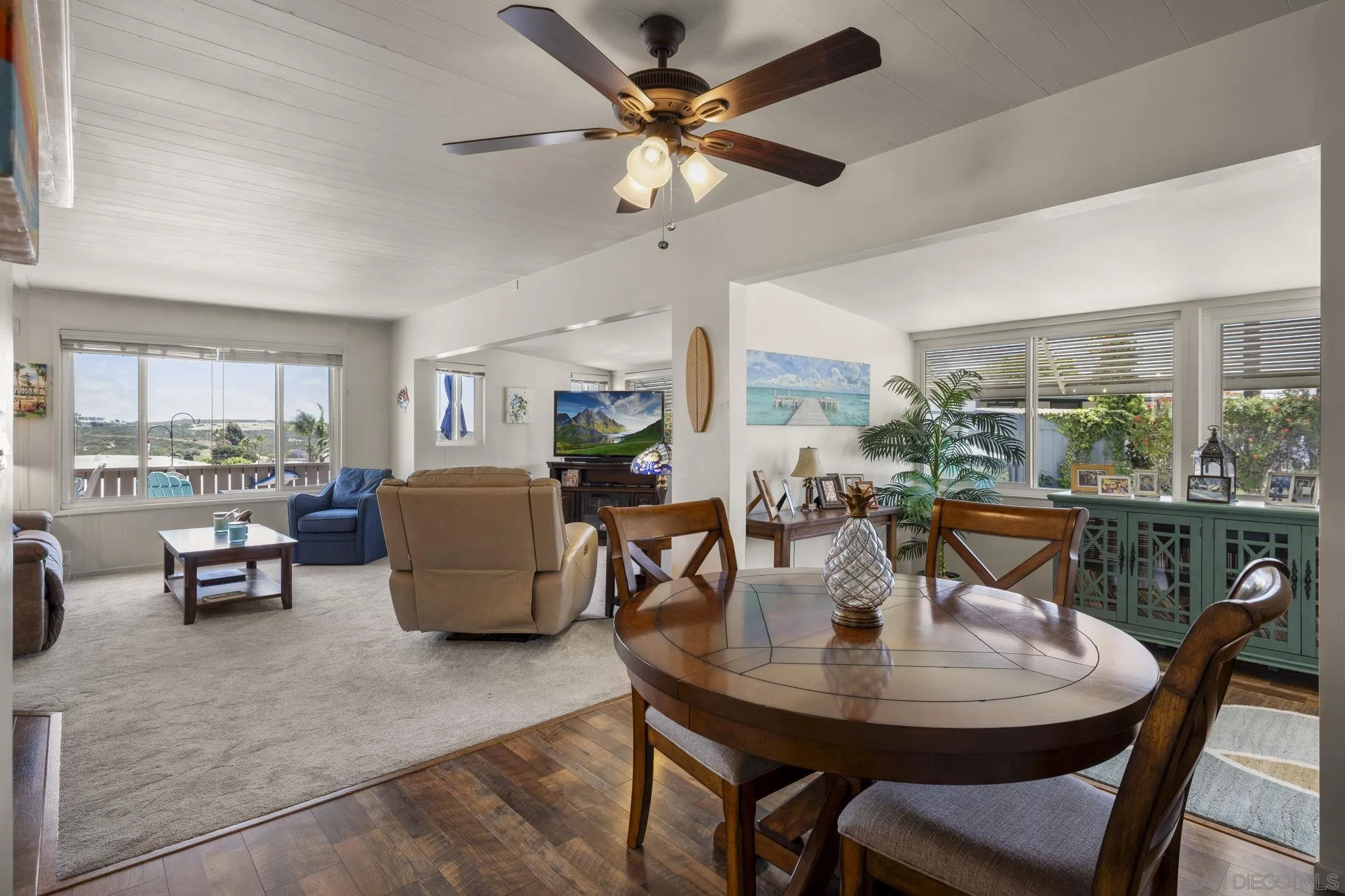 116 Havenview Lane Oceanside, CA 92056 - Photo 12 of 47 a view of a dining room with furniture and a livingroom
