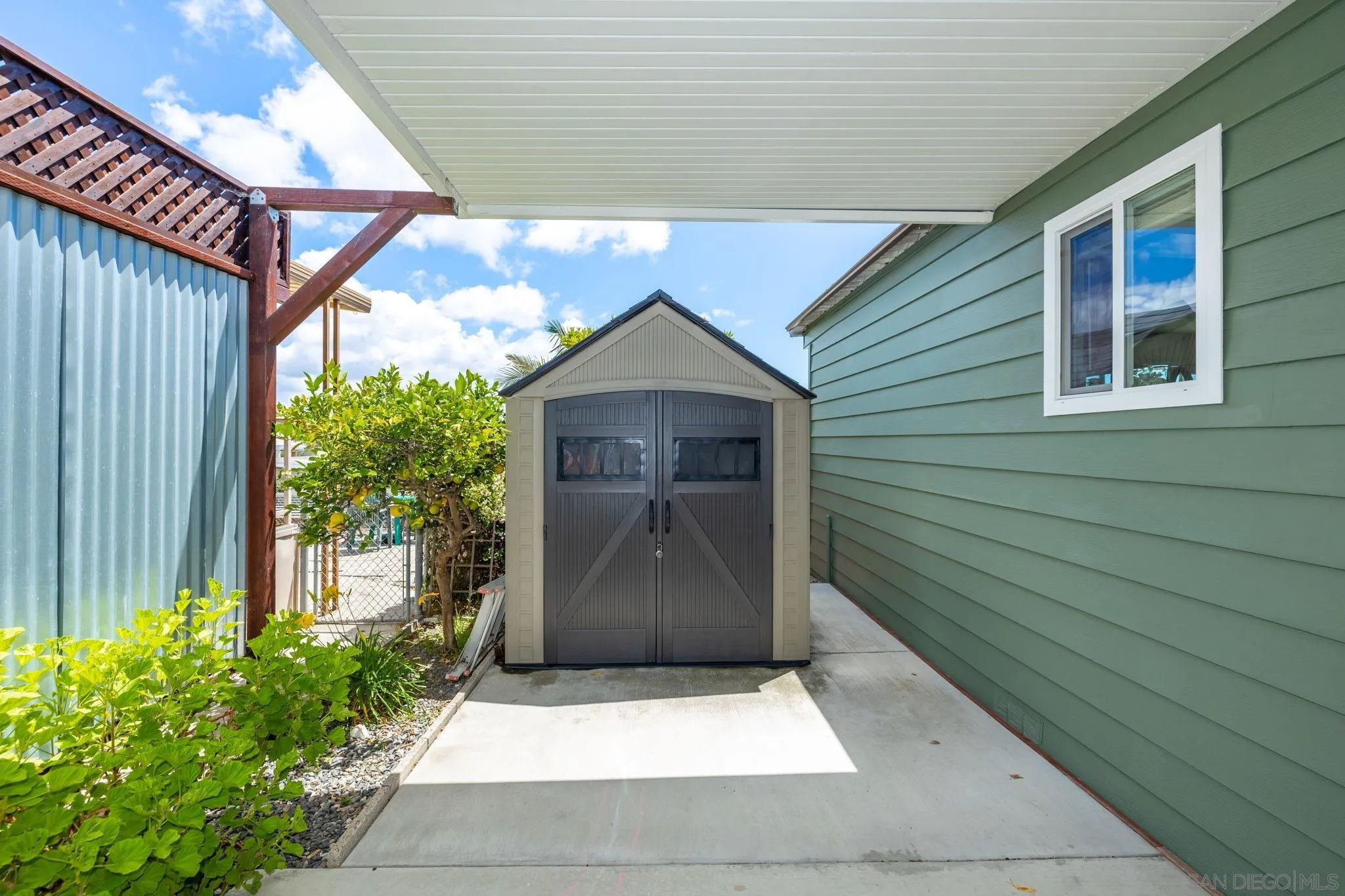 116 Havenview Lane Oceanside, CA 92056 - Photo 34 of 47 a front view of a house with garden