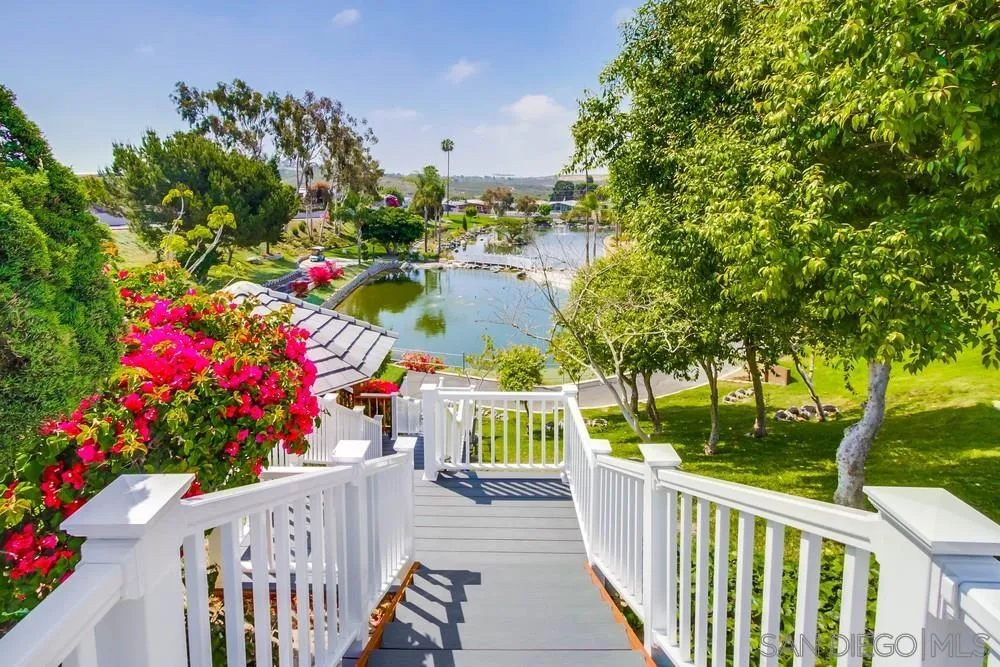 116 Havenview Lane Oceanside, CA 92056 - Photo 39 of 47 a view of a house with a flower garden
