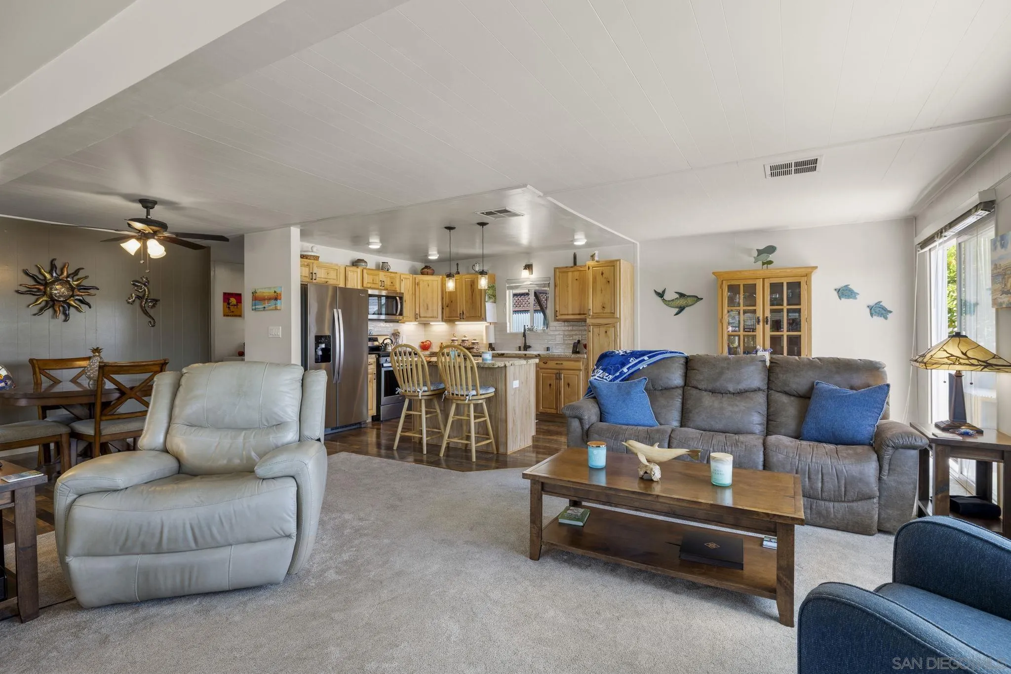 116 Havenview Lane Oceanside, CA 92056 - Photo 8 of 47 a living room with furniture and a large window
