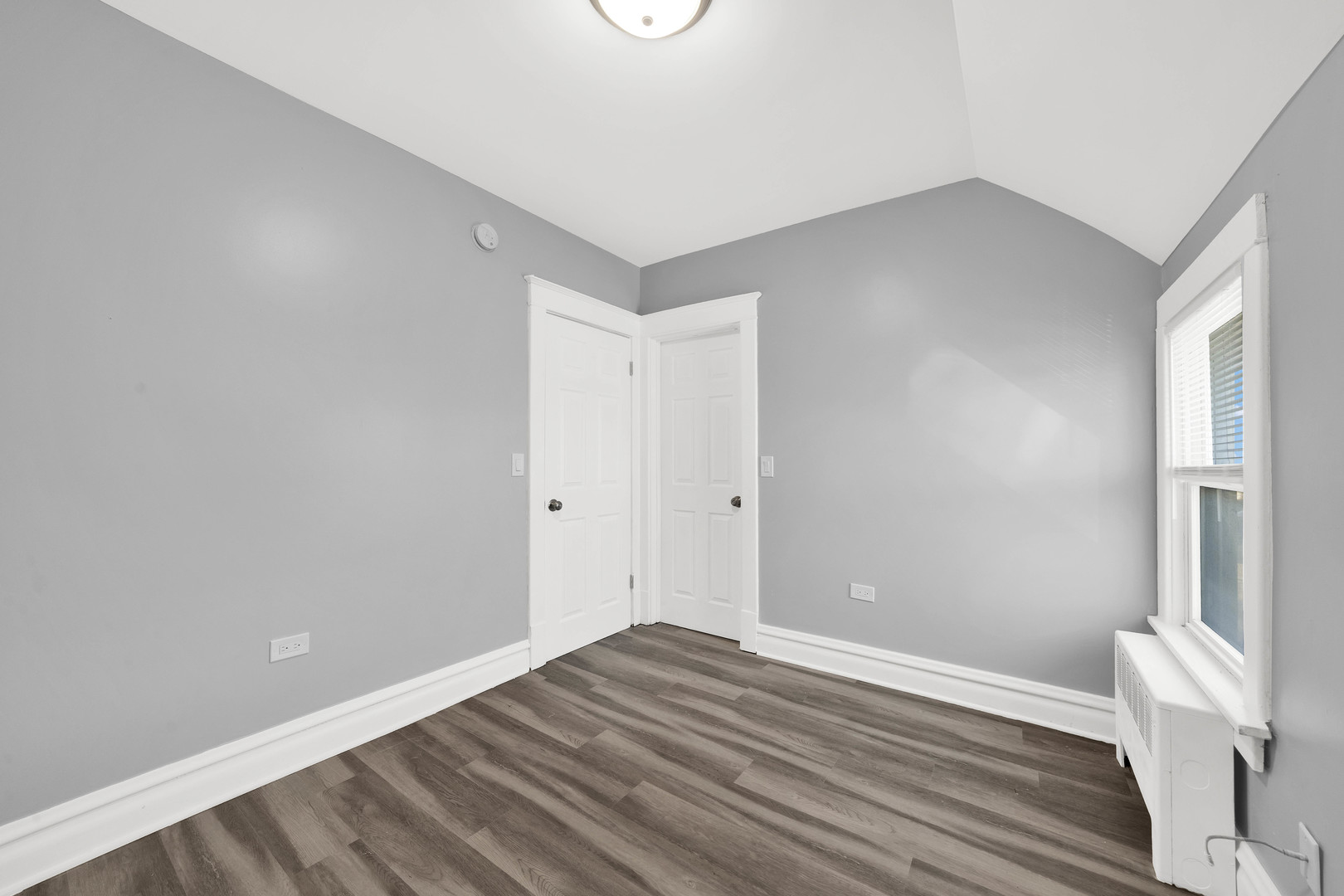 1915 Vermont Street Blue Island, IL 60406 - Photo 15 of 24 a view of wooden floor and windows in a room