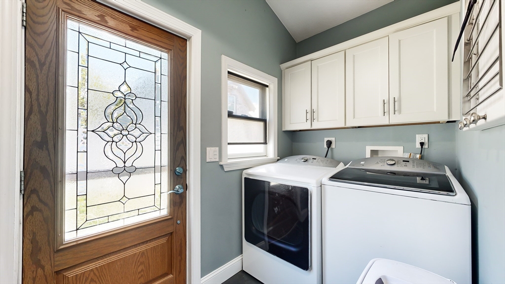 11 Atlantic Avenue Saugus, MA 01906 - Photo 11 of 22 a utility room with dryer and washer