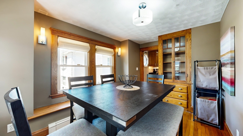 11 Atlantic Avenue Saugus, MA 01906 - Photo 4 of 22 a view of a dining room with furniture window and wooden floor