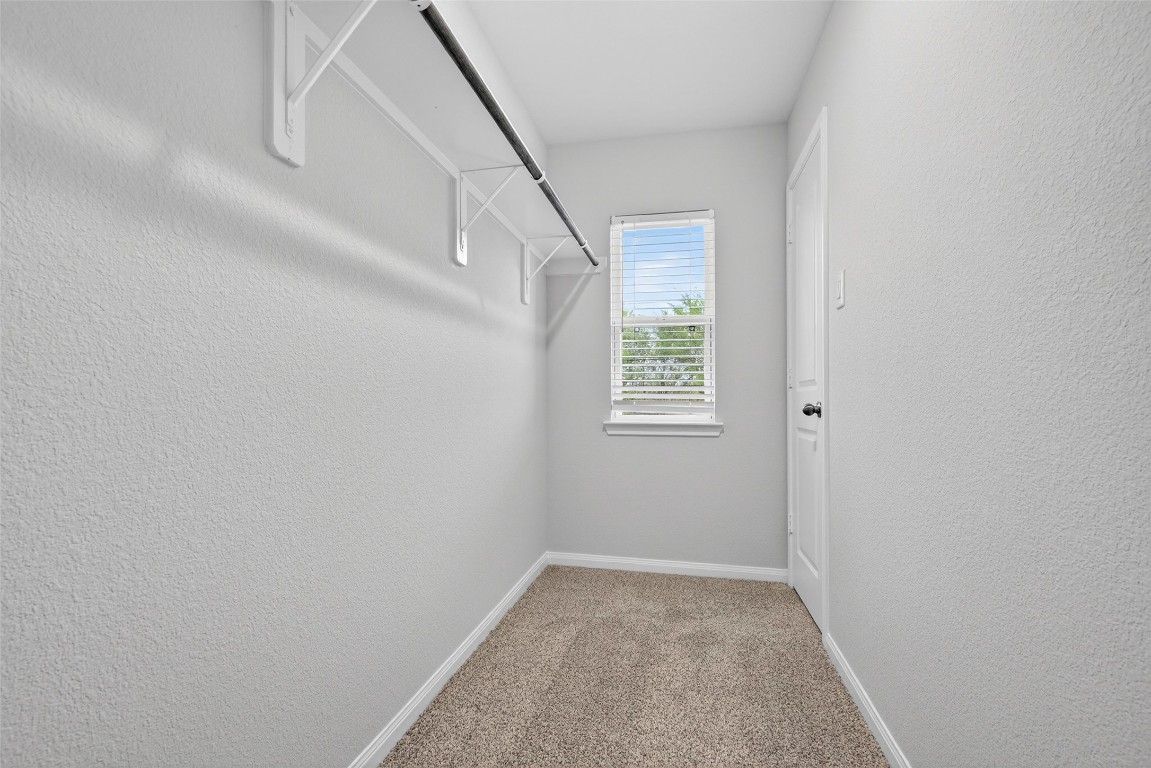 706 Universal Street Navasota, TX 77868 - Photo 20 of 40 a view of hallway with window