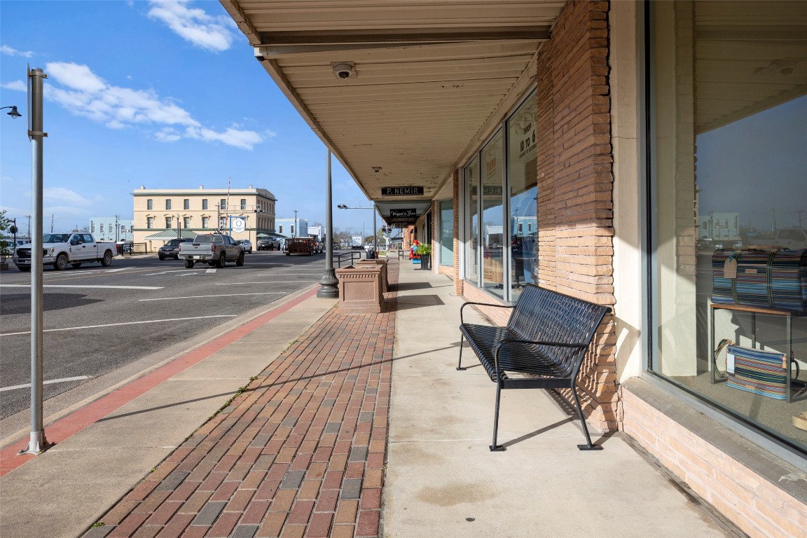 706 Universal Street Navasota, TX 77868 - Photo 39 of 40 a outdoor space with lots of furniture and couch