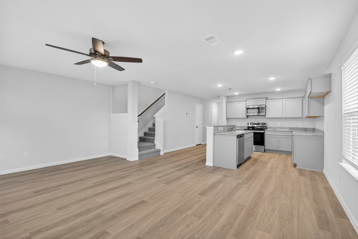 706 Universal Street Navasota, TX 77868 - Photo 5 of 40 a view of kitchen with wooden floor
