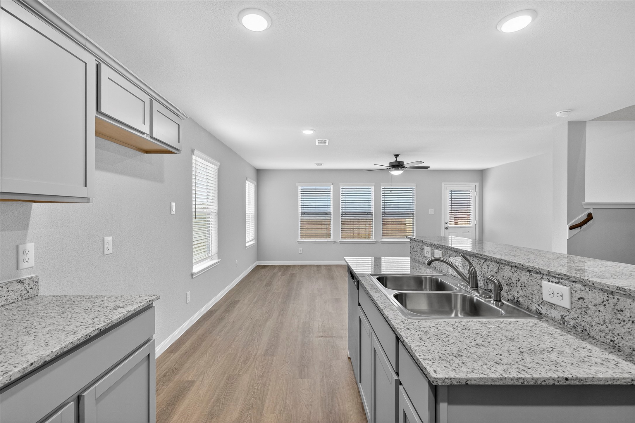 706 Universal Street Navasota, TX 77868 - Photo 10 of 40 a kitchen with granite countertop a sink and a stove