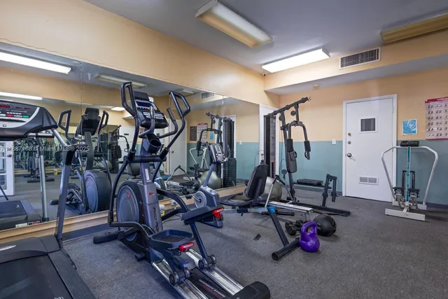 a view of a room with gym equipment