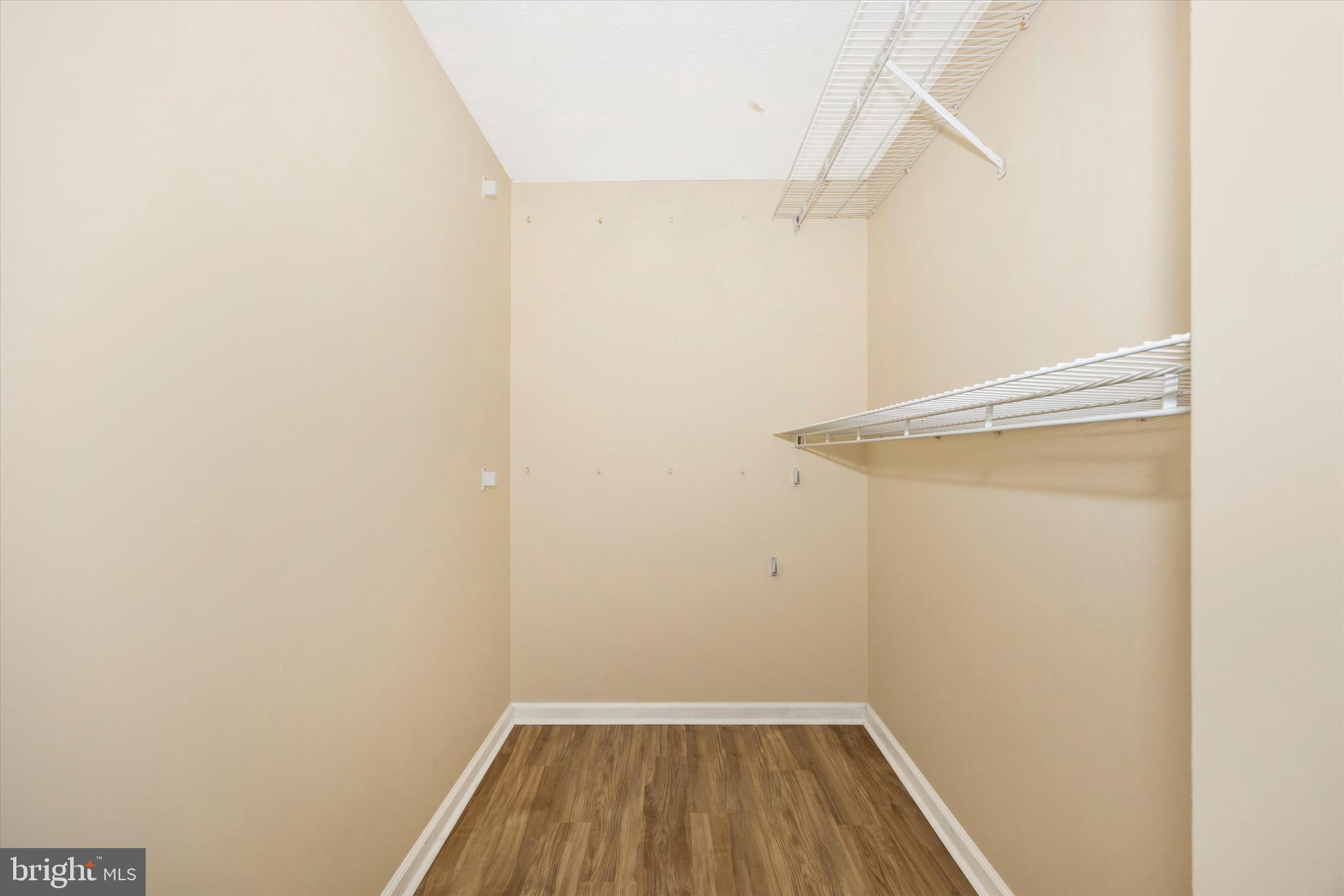 813 Stratford Way, Unit J Frederick, MD 21701 - Photo 15 of 25 Walk in closet in primary bedroom